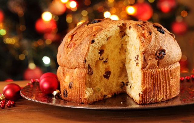 Holiday Panettone cake cut sitting on plate