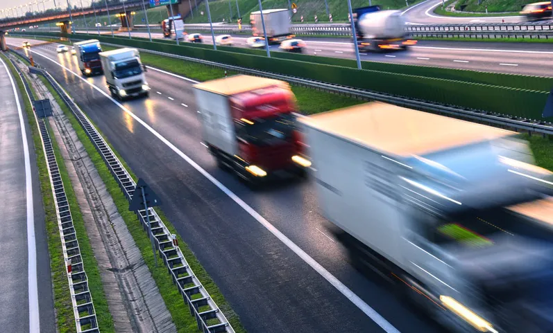 Trucks on four lane controlled-access highway in Poland.