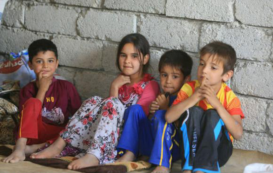 Crianças iraquianas que fugiram de Tal Afar