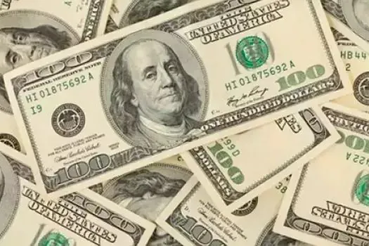 Dólar cai para R$ 5,56 com ambiente externo positivo