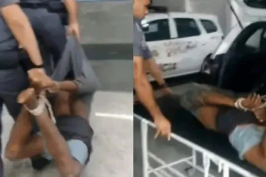 Homem negro é amarrado com cordas e carregado por policiais em SP