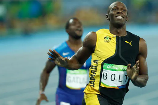 Usain Bolt faz história com tricampeonato nos 100 metros rasos